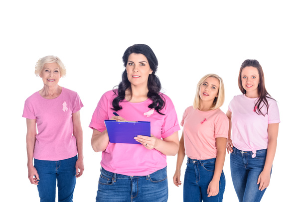 kobiety w różowe koszulki z wstążkami - Zdjęcie, obraz