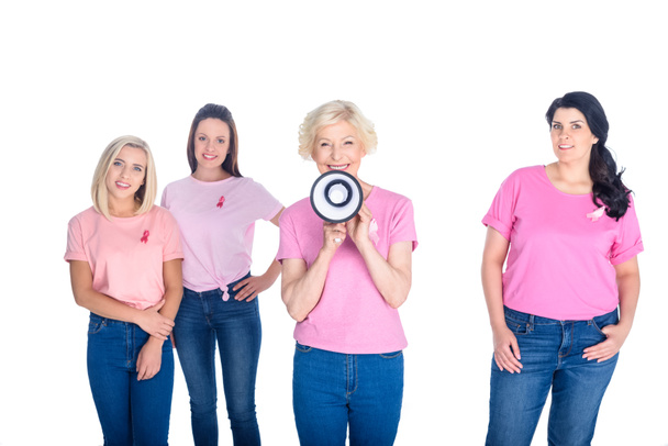 women in pink t-shirts with megaphone - 写真・画像