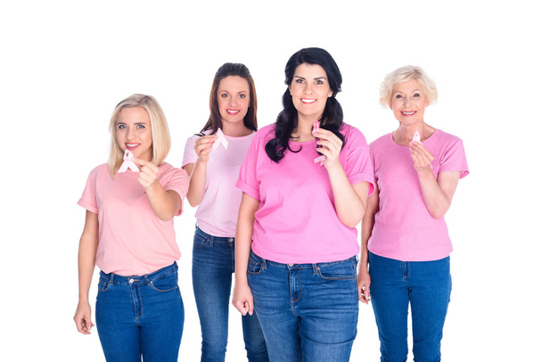 women in pink t-shirts with ribbons - Foto, immagini