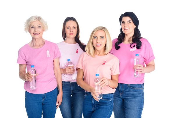 women with bottles of water - Photo, Image