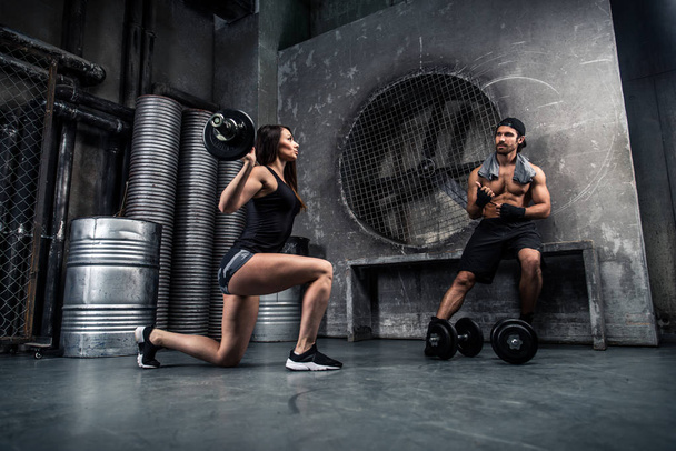 Couple training in a gym - Фото, изображение