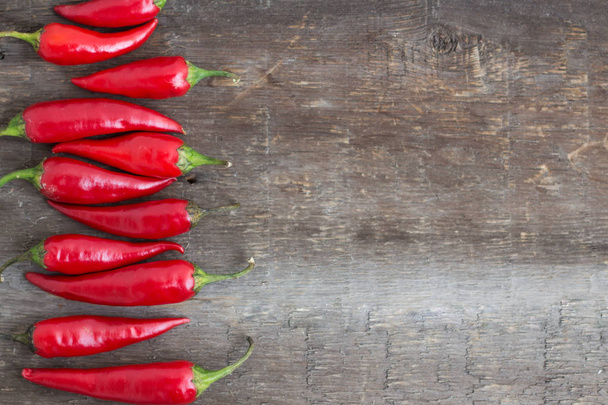 chili pepper on a wooden table - Φωτογραφία, εικόνα