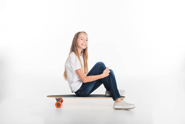 little female skateboarder - Фото, изображение