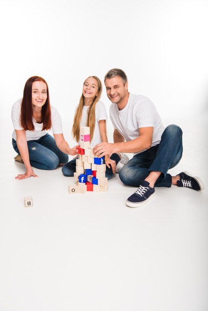 family playing with alphabet cubes - Foto, Imagem