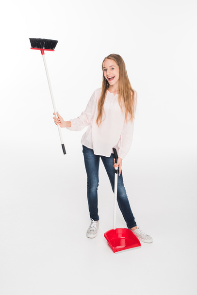 teen girl with broom - Foto, imagen