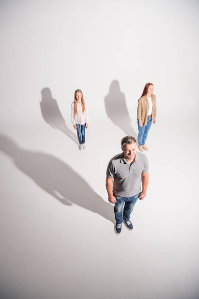 young family with shadows - Foto, Bild