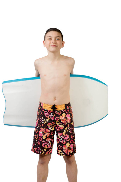 Young teenage caucasian boy with his body board - Fotoğraf, Görsel