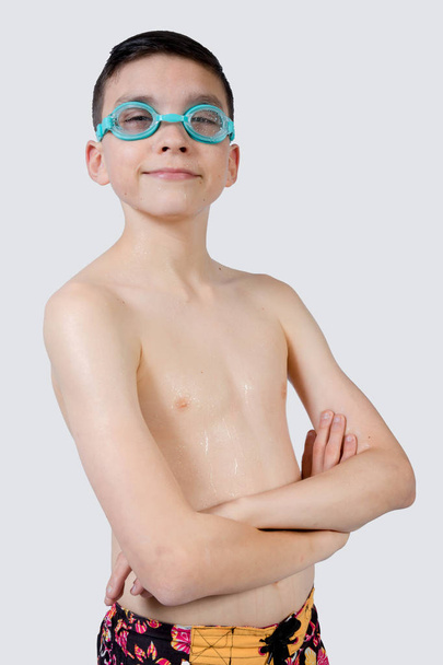 Young teenage caucasian boy wearing swimwear - Fotografie, Obrázek