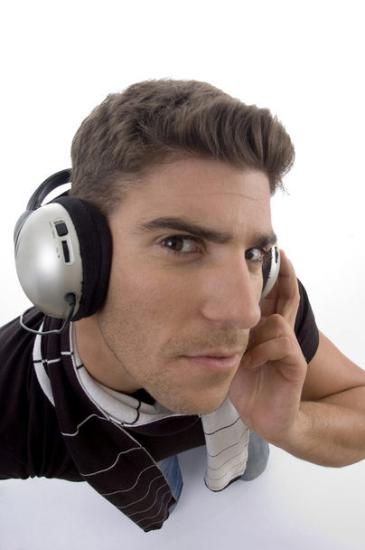 Male with headphones looking at camera - Φωτογραφία, εικόνα