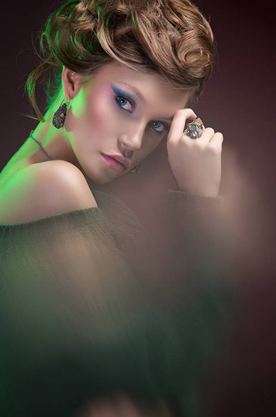 Beautiful, glamorous, girl, model in a photo studio with color f - Zdjęcie, obraz