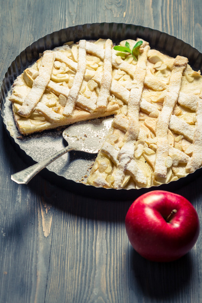 Baked apple pie on a baking tray - 写真・画像