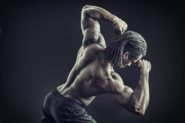 Back of african American bodybuilder man - Φωτογραφία, εικόνα