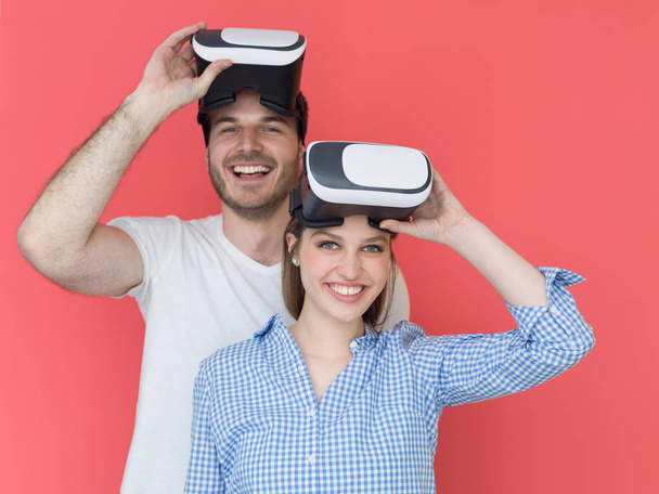 happy couple using VR-headset glasses of virtual reality - Photo, image