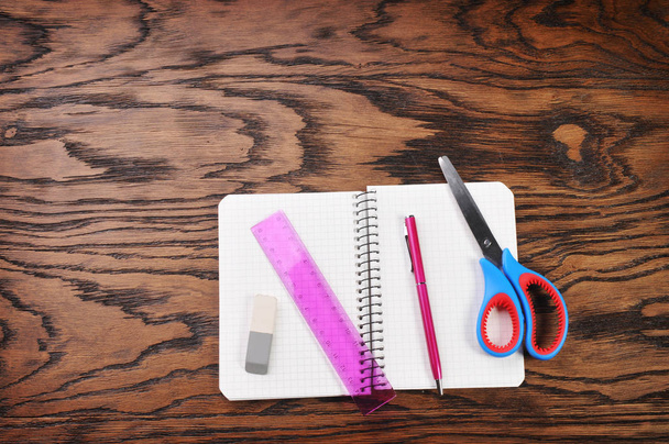 School notebook with scissors - Foto, afbeelding