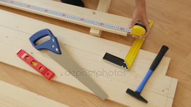Making slot rack with saw and tape measure - Footage, Video