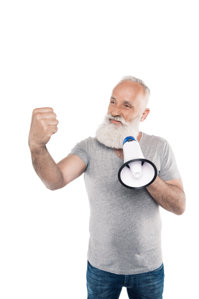 senior man with loudspeaker showing fist - Фото, изображение