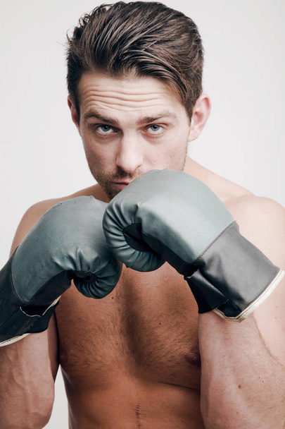 Attractive boxer with boxing gloves - Фото, изображение