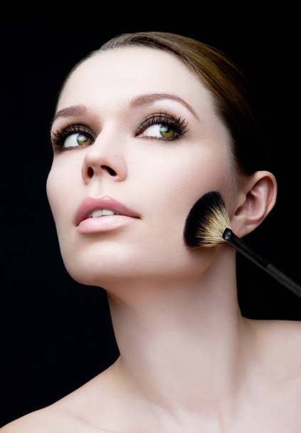 Young girl with brush for powder - Foto, Imagen