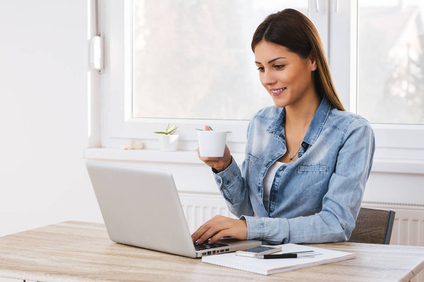 Woman working in home office  - Photo, image