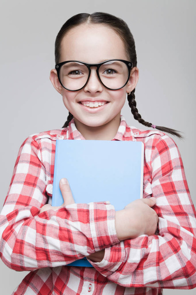 Schoolgirl in glasses - Фото, зображення