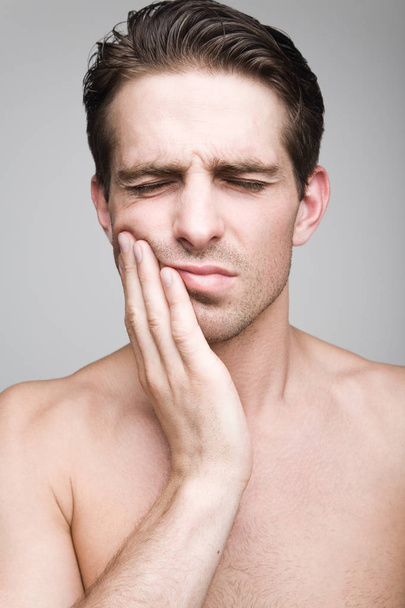 Toothache in young men - Foto, Bild