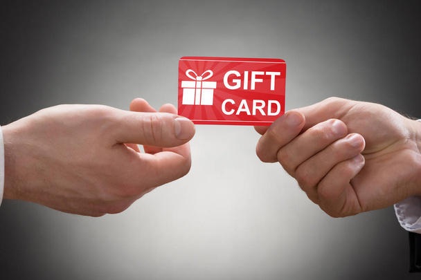 Hands Holding Gift Card - Foto, afbeelding