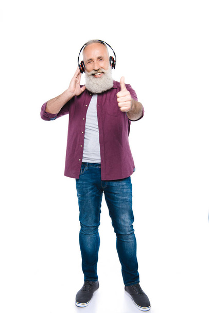homem idoso ouvindo música com fones de ouvido
 - Foto, Imagem