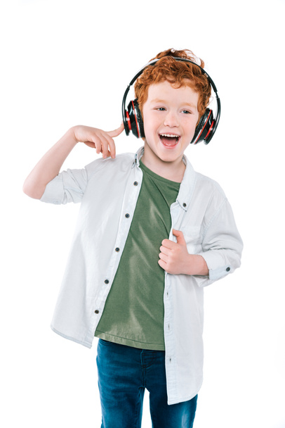 kid listening music with headphones - Foto, Bild