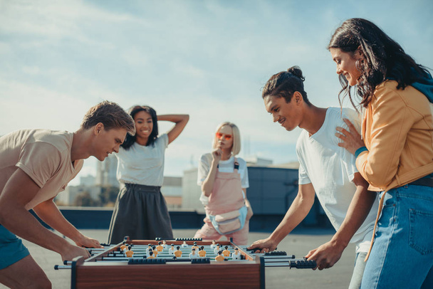 friends playing table football - Φωτογραφία, εικόνα