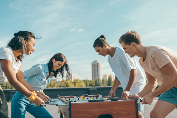 friends playing table football - 写真・画像