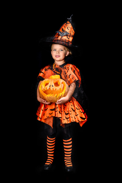 child in halloween costume of witch - Фото, изображение