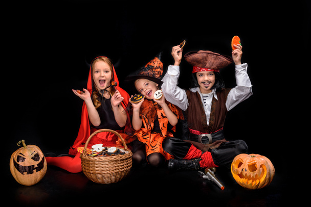 devil, witch and pirate with sweets - Photo, Image