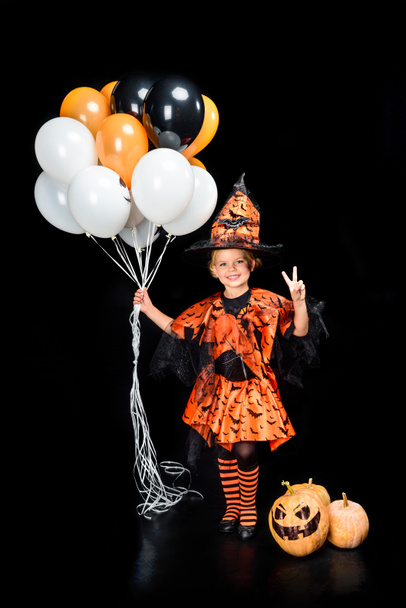 child in halloween costume of witch - Foto, afbeelding