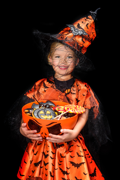 little witch with halloween sweets - Photo, Image