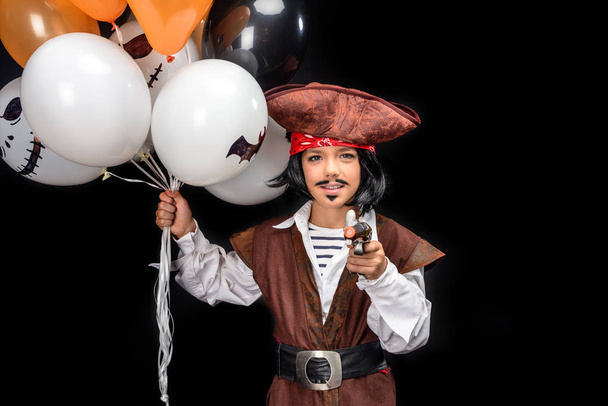 little pirate with gun and balloons - Photo, Image