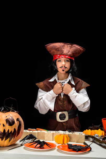 little pirate with halloween decorations  - Foto, Imagem