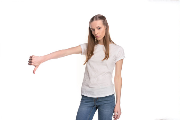 girl showing thumb down - Foto, Imagen