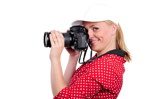 pretty blonde woman photographer with  camera, on white - Zdjęcie, obraz