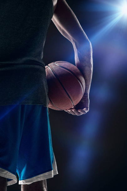 The portrait of a basketball player with ball - Photo, image