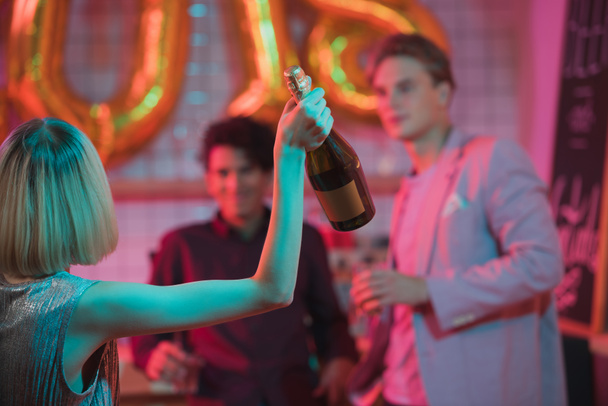 woman with bottle of champagne - Fotografie, Obrázek
