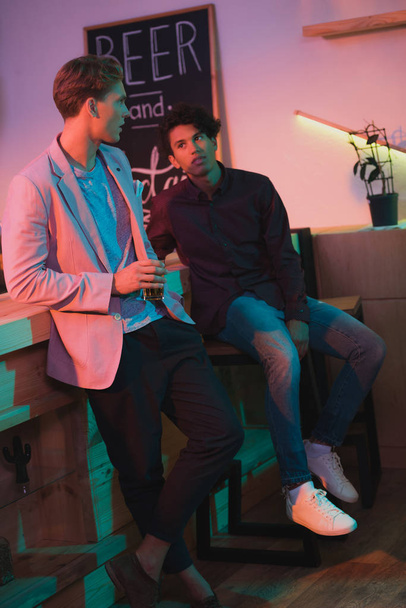 multiethnic men having conversation in bar - Foto, Imagem