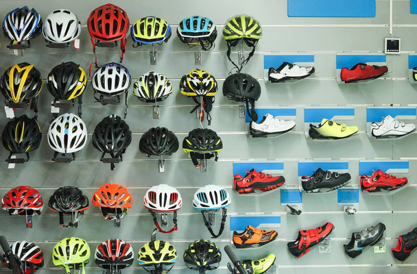 Bicycle helmets and shoes - Фото, изображение