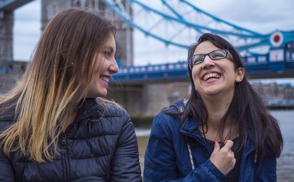 Two girls visit London and enjoy the trip and sightseeing - 写真・画像
