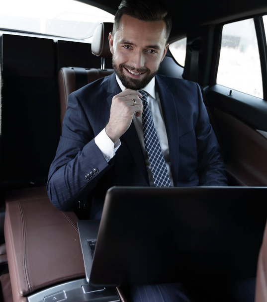 Business people use a laptop - Фото, изображение
