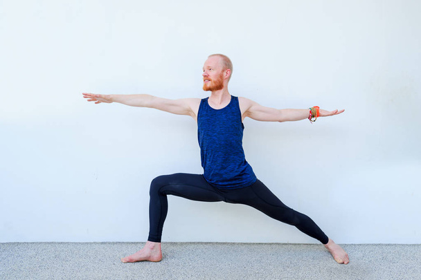Yoga teacher showing different yoga poses  - Photo, Image