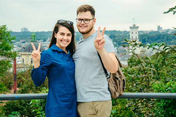 couple with european city on background - Photo, Image