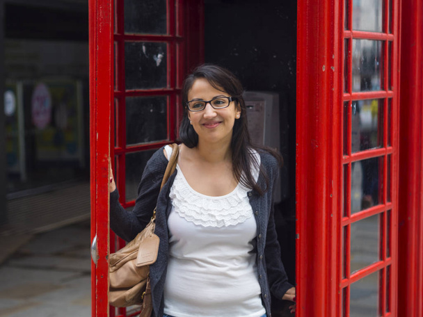 Photo shoot at a typical British phone booth - Foto, immagini