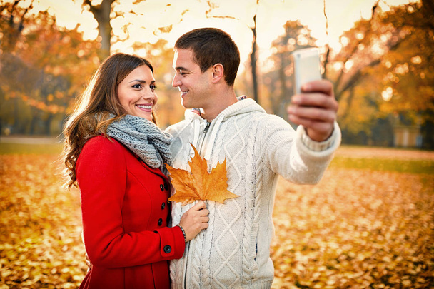 Selfie in park in autumn - Photo, image