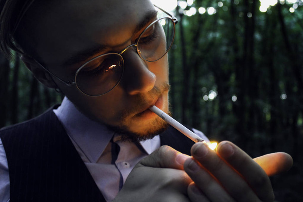 The guy smokes - Photo, image