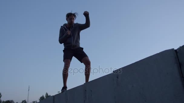 Talented guy practising shadow-boxing - Felvétel, videó